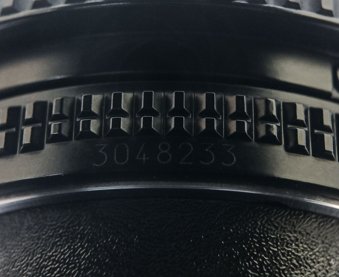 Serial number on lens aperture ring